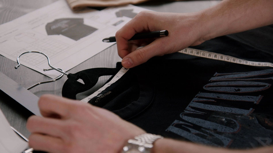 DSA-clothing-manufacturer-uk measuring the neck of a t-shirt
